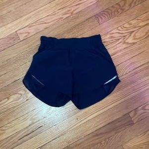 Navy blue lululemon 4” high rise hottie hots - size 4